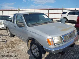 2000 Nissan Frontier 2WD XE with VIN 1N6DD26S5YC300697, listed as a IAAI auction lot 42031559 with 217,046 mi miles. Bid and sale history available at carsss.com. Image 1.
