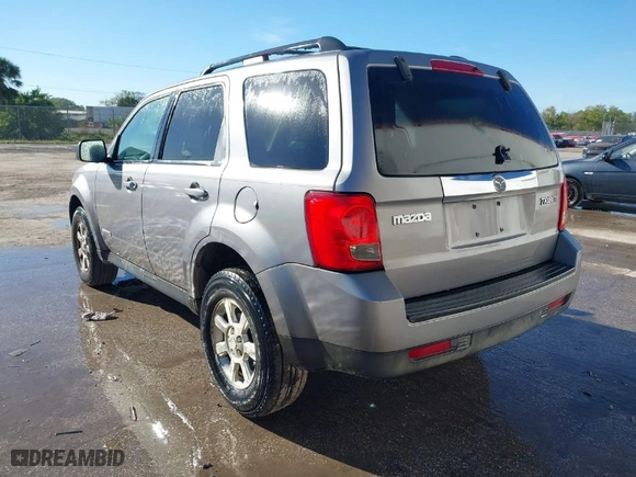 2008 Mazda Tribute Grand Touring with VIN 4F2CZ02Z78KM12026, listed as a IAAI auction lot 41671615 with 204,422 mi miles. Bid and sale history available at carsss.com. Image 3.