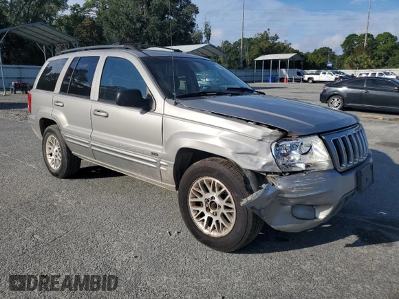 2002 Jeep Grand Cherokee Limited with VIN 1J4GX58S32C149852, listed as a Copart auction lot 71655864 with 190,918 mi miles and Salvage Title. Bid and sale history available at DreamBid. Image 4.