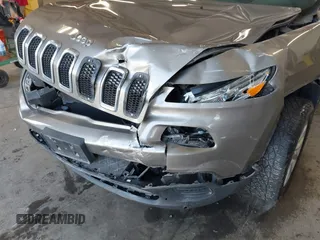 2017 Jeep Cherokee Sport with VIN 1C4PJMAB2HW537884, listed as a IAAI auction lot 42415829 with 89,451 mi miles and . Bid and sale history available at DreamBid. Image 6.