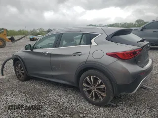 2018 Infiniti QX30 Premium with VIN SJKCH5CR7JA049931, listed as a Copart auction lot 52024955 with 94,588 mi miles and Clean title. Bid and sale history available at DreamBid. Image 2.