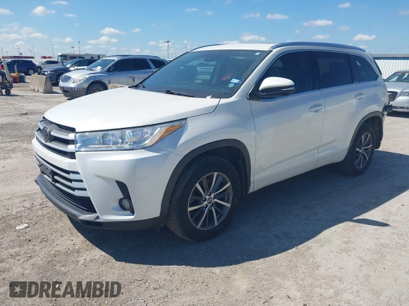 2018 Toyota Highlander SE with VIN 5TDKZRFH8JS548391, listed as a IAAI auction lot 42227742 with 79,782 mi miles and . Bid and sale history available at DreamBid. Image 2.