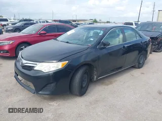2014 Toyota Camry L with VIN 4T1BF1FK8EU468379, listed as a IAAI auction lot 42134387 with 101,603 mi miles and . Bid and sale history available at DreamBid. Image 2.