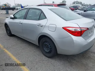 2015 Toyota Corolla L with VIN 5YFBURHE6FP259379, listed as a IAAI auction lot 42153082 with 185,294 mi miles and . Bid and sale history available at DreamBid. Image 3.