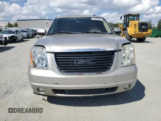 2007 GMC Yukon XL SLT z VIN 1GKFC16037R181233, wystawiony jako Copart lot #61639285 z przebiegiem 152 408 mil mil oraz Czysty tytuł • Clean title. Historia ofert i sprzedaży dostępna na DreamBid. Obrazek 5.