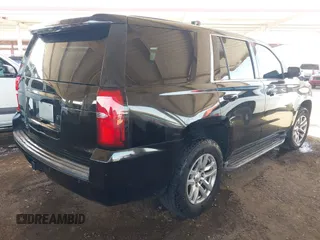2015 Chevrolet Tahoe Commercial z VIN 1GNLC2EC0FR629983, wystawiony jako IAAI lot #41917584 z przebiegiem 111 461 mil mil oraz . Historia ofert i sprzedaży dostępna na DreamBid. Obrazek 4.