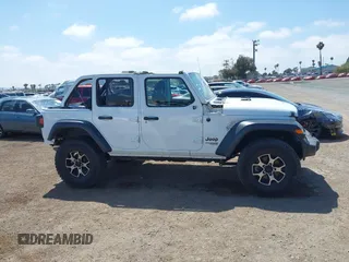 2018 Jeep Wrangler Unlimited Sport S z VIN 1C4HJXDG6JW210973, wystawiony jako IAAI lot #42154094 z przebiegiem 116 620 mil mil oraz . Historia ofert i sprzedaży dostępna na DreamBid. Obrazek 13.
