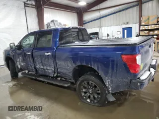 2017 Nissan Titan XD SL with VIN 1N6AA1F40HN515951, listed as a Copart auction lot 87587115 with 79,970 mi miles and Salvage Title. Bid and sale history available at carsss.com. Image 2.