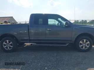 2018 Ford F-150 XL with VIN 1FTFX1E58JFD92806, listed as a IAAI auction lot 42424589 with 144,476 mi miles and . Bid and sale history available at DreamBid. Image 13.