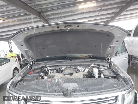 2015 Chevrolet Tahoe LTZ with VIN 1GNSCCKC5FR123099, listed as a IAAI auction lot 41391974 with Not provided miles and . Bid and sale history available at DreamBid. Image 10.