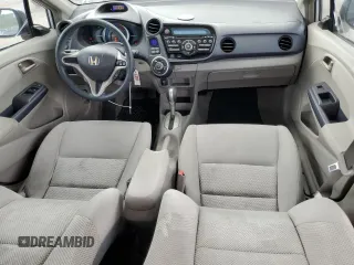 2010 Honda Insight EX with VIN JHMZE2H79AS038112, listed as a Copart auction lot 54794785 with 183,457 mi miles and Salvage Title. Bid and sale history available at DreamBid. Image 8.