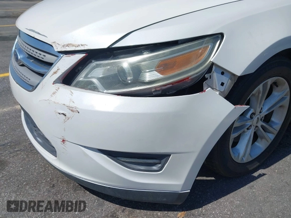 2014 Ford Taurus SEL with VIN 1FAHP2E86EG132676, listed as a IAAI auction lot 41943392 with 183,633 mi miles. Bid and sale history available at carsss.com. Image 6.