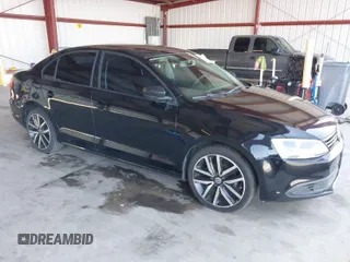 2014 Volkswagen Jetta Sedan S with VIN 3VW2K7AJ1EM311148, listed as a IAAI auction lot 40418942 with 192,015 mi miles. Bid and sale history available at carsss.com. Image 1.