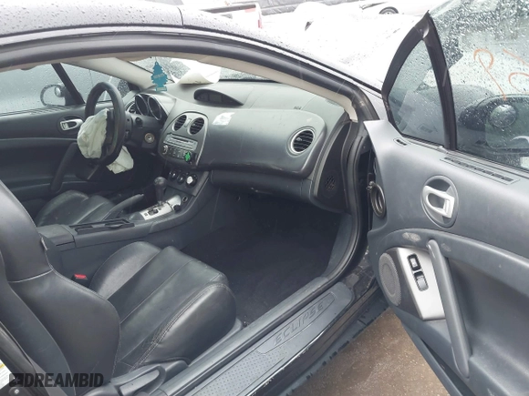 2007 Mitsubishi Eclipse SE with VIN 4A3AK64F77E072243, listed as a IAAI auction lot 41656069 with 164,174 mi miles. Bid and sale history available at carsss.com. Image 5.
