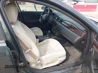 2014 Chevrolet Impala LT with VIN 2G1WB5E33E1180051, listed as a IAAI auction lot 42225939 with 162,161 mi miles and . Bid and sale history available at DreamBid. Image 5.
