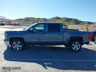 2014 Chevrolet Silverado 1500 LT with VIN 3GCPCREH7EG299238, listed as a IAAI auction lot 41831255 with 129,850 mi miles. Bid and sale history available at carsss.com. Image 13.