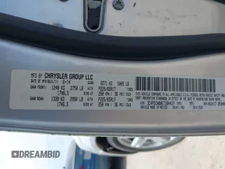 2014 Dodge Journey SE with VIN 3C4PDCAB0ET284437, listed as a IAAI auction lot 42063601 with 206,913 mi miles and . Bid and sale history available at carsss.com. Image 9.