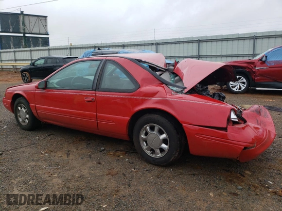 1996 Ford Thunderbird LX z VIN 1FALP62W8TH174603, wystawiony jako Copart lot #72928574 z przebiegiem 153 614 mil mil oraz Szkoda całkowita • Salvage title. Historia ofert i sprzedaży dostępna na DreamBid. Obrazek 2.