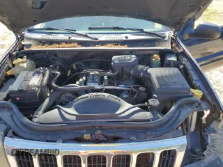 2000 Jeep Grand Cherokee Laredo with VIN 1J4GW48S2YC398116, listed as a Copart auction lot 61828385 with 251,791 mi miles and Clean title. Bid and sale history available at DreamBid. Image 12.