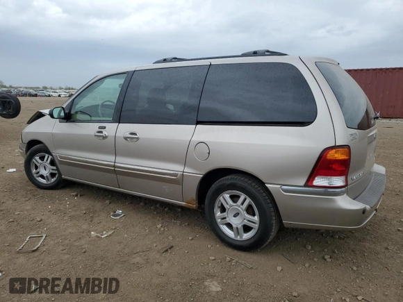 2003 Ford Windstar SE with VIN 2FMDA52413BB59104, listed as a Copart auction lot 55134805 with 132,918 mi miles and Salvage title. Bid and sale history available at DreamBid. Image 2.