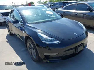 2020 Tesla Model 3 Standard Range Plus z VIN 5YJ3E1EA3LF611152, wystawiony jako IAAI lot #42256503 z przebiegiem 78 633 mil mil oraz . Historia ofert i sprzedaży dostępna na DreamBid. Obrazek 1.