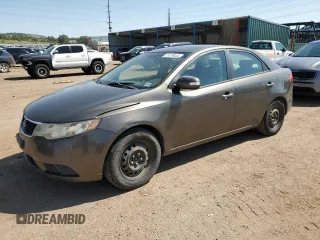 2010 Kia Forte EX with VIN KNAFU4A22A5880772, listed as a Copart auction lot 71679444 with 150,734 mi miles and Salvage Title. Bid and sale history available at carsss.com. Image 1.