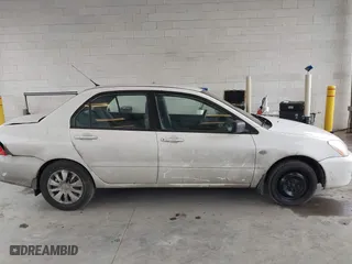 2006 Mitsubishi Lancer ES with VIN JA3AJ26E86U060513, listed as a IAAI auction lot 41980244 with 154,379 mi miles. Bid and sale history available at carsss.com. Image 13.