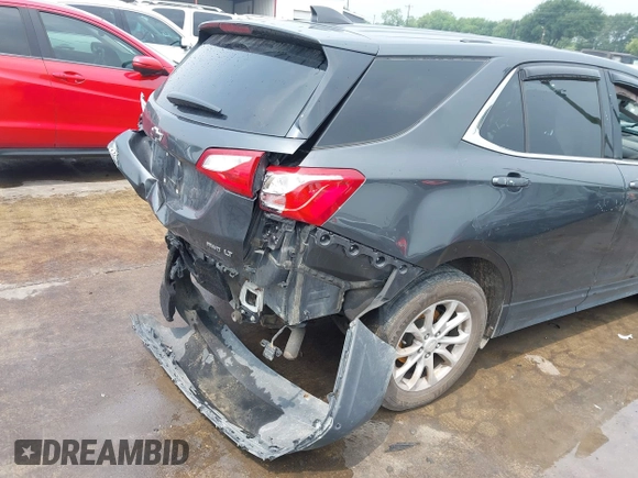 2018 Chevrolet Equinox LT z VIN 2GNAXSEV0J6272001, wystawiony jako IAAI lot #42185011 z przebiegiem 108 899 mil mil oraz . Historia ofert i sprzedaży dostępna na DreamBid. Obrazek 18.