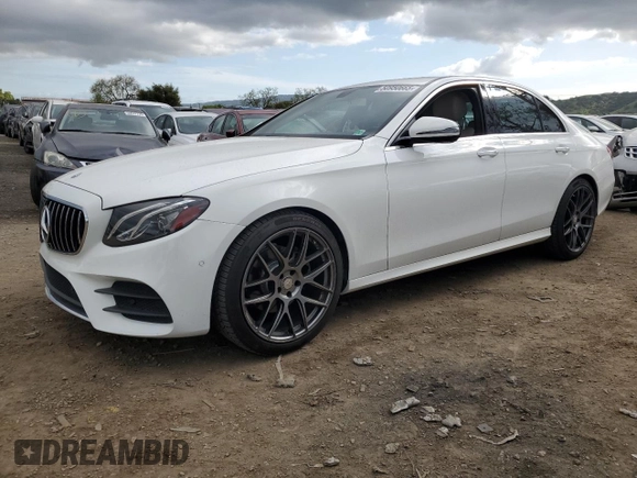 2018 Mercedes-Benz E 300 with VIN WDDZF4JB2JA329815, listed as a Copart auction lot 50950665 with 61,543 mi miles and Salvage Title. Bid and sale history available at DreamBid. Image 1.
