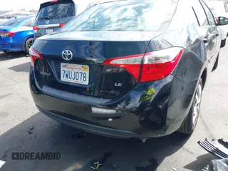 2015 Toyota Corolla L z VIN 2T1BURHE8FC320344, wystawiony jako IAAI lot #41712355 z przebiegiem Nie podano mil oraz . Historia ofert i sprzedaży dostępna na DreamBid. Obrazek 17.