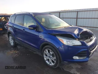 2014 Ford Escape Titanium with VIN 1FMCU9JX4EUD30964, listed as a IAAI auction lot 41772153 with 179,481 mi miles and . Bid and sale history available at DreamBid. Image 1.