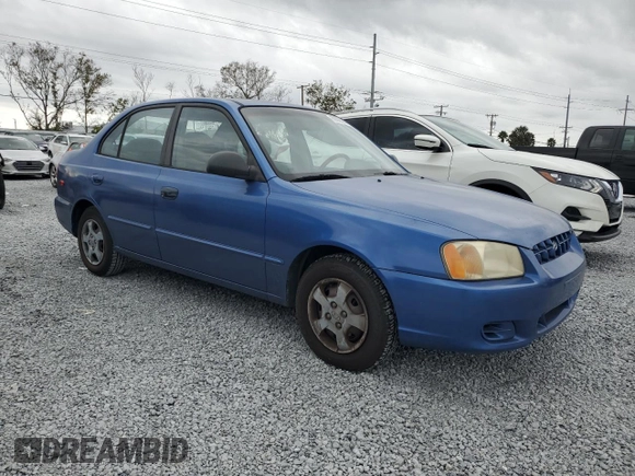 2002 Hyundai Accent GL with VIN KMHCG45C82U355914, listed as a Copart auction lot 89006295 with 60,907 mi miles and Clean Title. Bid and sale history available at carsss.com. Image 4.