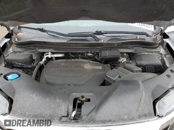 2018 Honda Pilot Touring z VIN 5FNYF6H94JB039992, wystawiony jako Copart lot #57128435 z przebiegiem 85 578 mil mil oraz Szkoda całkowita • Salvage title. Historia ofert i sprzedaży dostępna na DreamBid. Obrazek 12.