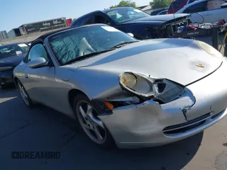 1999 Porsche 911 with VIN WP0CA2999XS652816, listed as a IAAI auction lot 41975822 with 291,258 mi miles and . Bid and sale history available at DreamBid. Image 21.