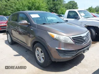 2011 Kia Sportage LX with VIN KNDPBCA2XB7044124, listed as a IAAI auction lot 42853883 with 218,654 mi miles and . Bid and sale history available at DreamBid. Image 1.
