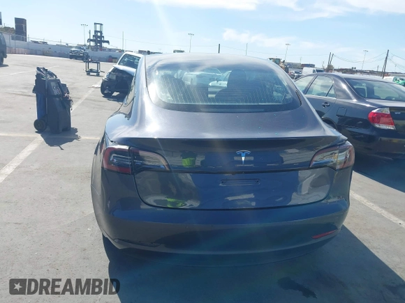 2022 Tesla Model 3 with VIN 5YJ3E1EA1NF142713, listed as a IAAI auction lot 42027630 with 112,557 mi miles. Bid and sale history available at carsss.com. Image 15.
