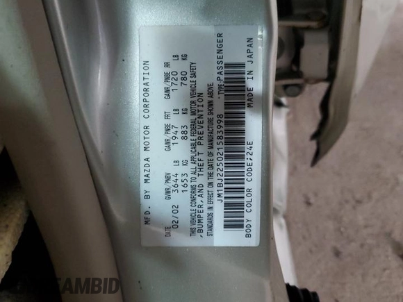 2002 Mazda Protege DX with VIN JM1BJ225021583998, listed as a Copart auction lot 49874135 with Not Provided miles and Non Repairable. Bid and sale history available at DreamBid. Image 12.