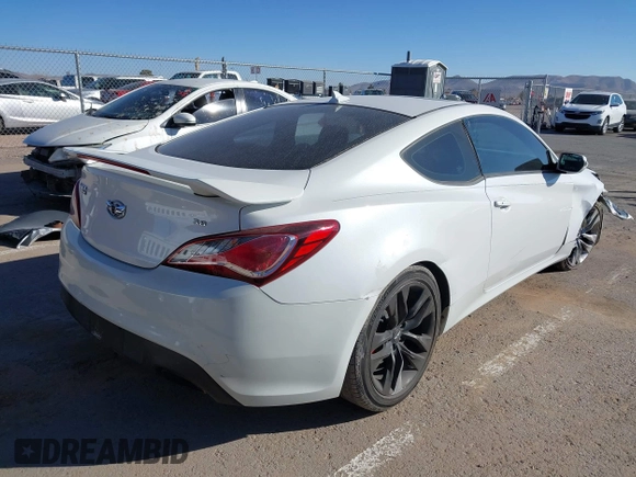 2013 Hyundai Genesis Coupe R-Spec z VIN KMHHU6KJ2DU101504, wystawiony jako IAAI lot #41469836 z przebiegiem 98 779 mil mil oraz . Historia ofert i sprzedaży dostępna na DreamBid. Obrazek 4.