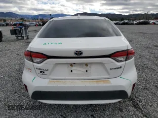 2021 Toyota Corolla Hybrid LE with VIN JTDEAMDE3MJ013373, listed as a Copart auction lot 48709785 with 136,422 mi miles and Salvage Title. Bid and sale history available at carsss.com. Image 6.