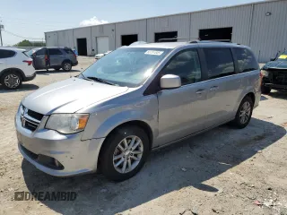 2018 Dodge Grand Caravan SXT z VIN 2C4RDGCG5JR253559, wystawiony jako Copart lot #60751045 z przebiegiem 346 113 mil mil oraz Czysty tytuł • Clean title. Historia ofert i sprzedaży dostępna na DreamBid. Obrazek 1.