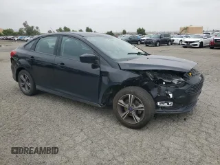 2018 Ford Focus SE with VIN 1FADP3FE8JL300246, listed as a Copart auction lot 59585035 with 83,141 mi miles and Salvage title. Bid and sale history available at DreamBid. Image 4.