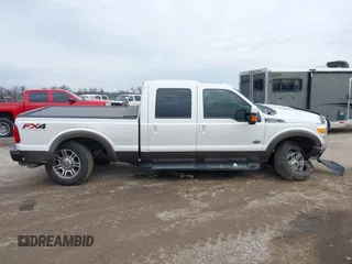 2015 Ford Super Duty F-250 SRW Lariat with VIN 1FT7W2BT0FEB68815, listed as a IAAI auction lot 41574350 with 162,905 mi miles. Bid and sale history available at carsss.com. Image 13.