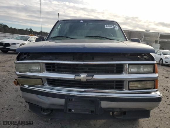 1999 Chevrolet Tahoe with VIN 3GNEK18R4XG124715, listed as a Copart auction lot 84744304 with 276,891 mi miles and Clean Title. Bid and sale history available at carsss.com. Image 5.