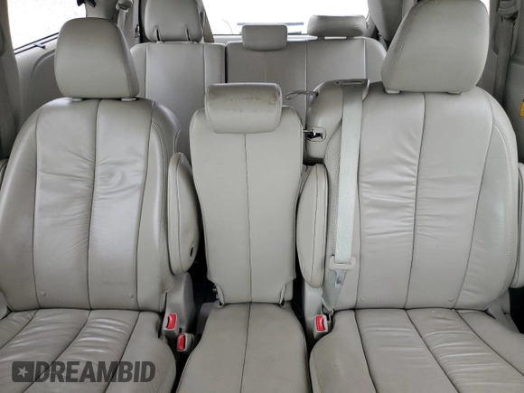 2012 Toyota Sienna XLE AAS с VIN 5TDYK3DC7CS207716, выставлен на аукционе Copart как лот 60592265 с пробегом 287 021 миль миль и Списание • Salvage title. История ставок и продаж доступна на DreamBid. Изображение 10.