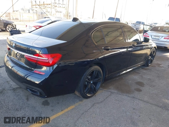 2019 BMW 7 Series 740i with VIN WBA7E2C58KB218419, listed as a IAAI auction lot 41831080 with 97,752 mi miles and . Bid and sale history available at DreamBid. Image 4.
