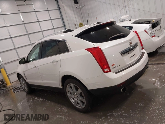 2012 Cadillac SRX Premium Collection z VIN 3GYFNFE38CS591123, wystawiony jako IAAI lot #41827636 z przebiegiem 143 867 mil mil oraz . Historia ofert i sprzedaży dostępna na DreamBid. Obrazek 15.