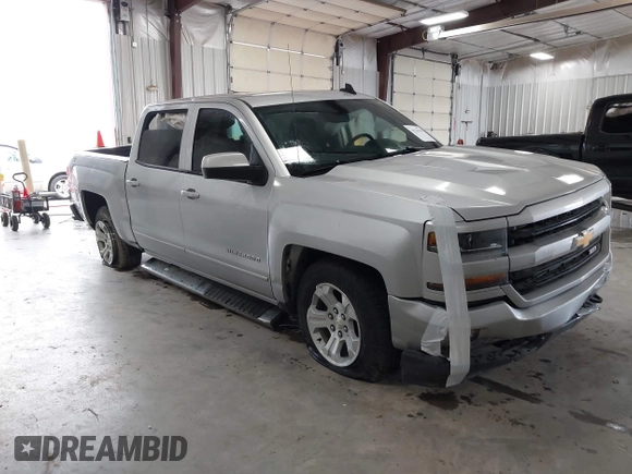 2017 Chevrolet Silverado 1500 LT with VIN 3GCUKREC2HG473554, listed as a IAAI auction lot 42220143 with 80,000 mi miles and . Bid and sale history available at DreamBid. Image 1.