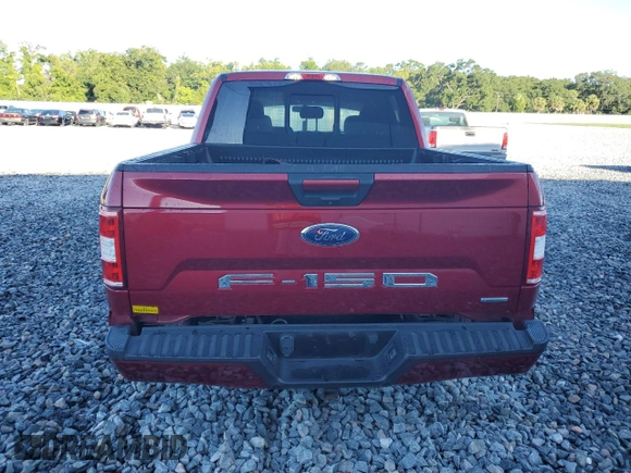 2018 Ford F-150 XL with VIN 1FTEW1CP0JFD02261, listed as a Copart auction lot 61850405 with 107,299 mi miles and Salvage title. Bid and sale history available at DreamBid. Image 6.