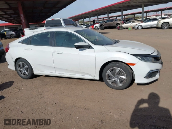 2019 Honda Civic Sedan LX with VIN 2HGFC2F62KH573149, listed as a IAAI auction lot 41575660 with 104,139 mi miles. Bid and sale history available at carsss.com. Image 13.