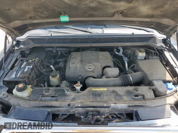 2013 Nissan Titan Pro-4X with VIN 1N6BA0EC3DN310741, listed as a Copart auction lot 57171975 with 146,524 mi miles and Salvage title. Bid and sale history available at DreamBid. Image 11.